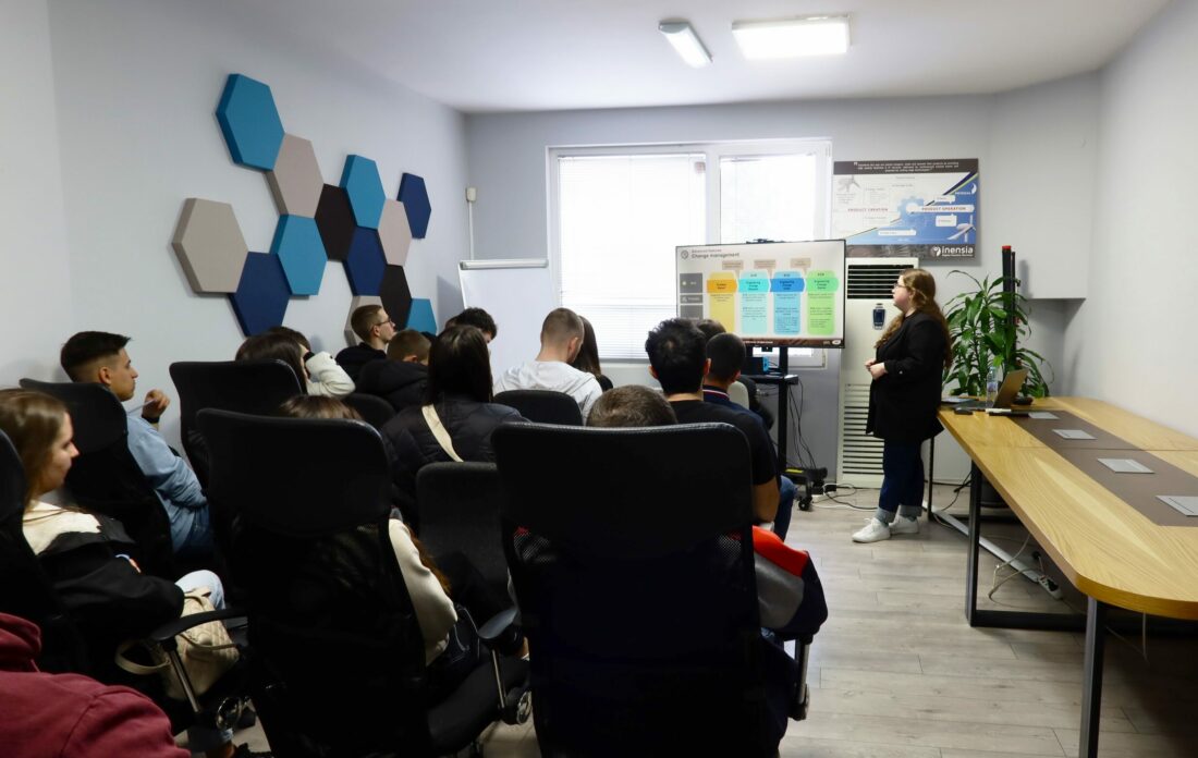 Group of Technical University of Sofia students attending an interactive presentation by INENSIA’s team at their modern Sofia office, with a focus on career paths and innovative tech.