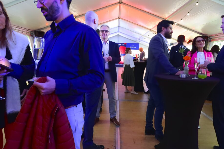 Inensia representative networking with attendees at the French Tech Event.