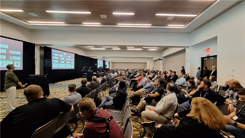 Engaged audience at Realize LIVE Americas 2025, participating in sessions and exploring digital transformation solutions.