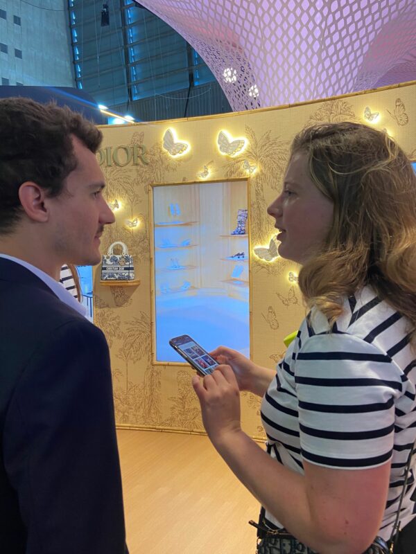 Nicolas from Inensia engaging in a networking discussion about digital transformation at VivaTech.