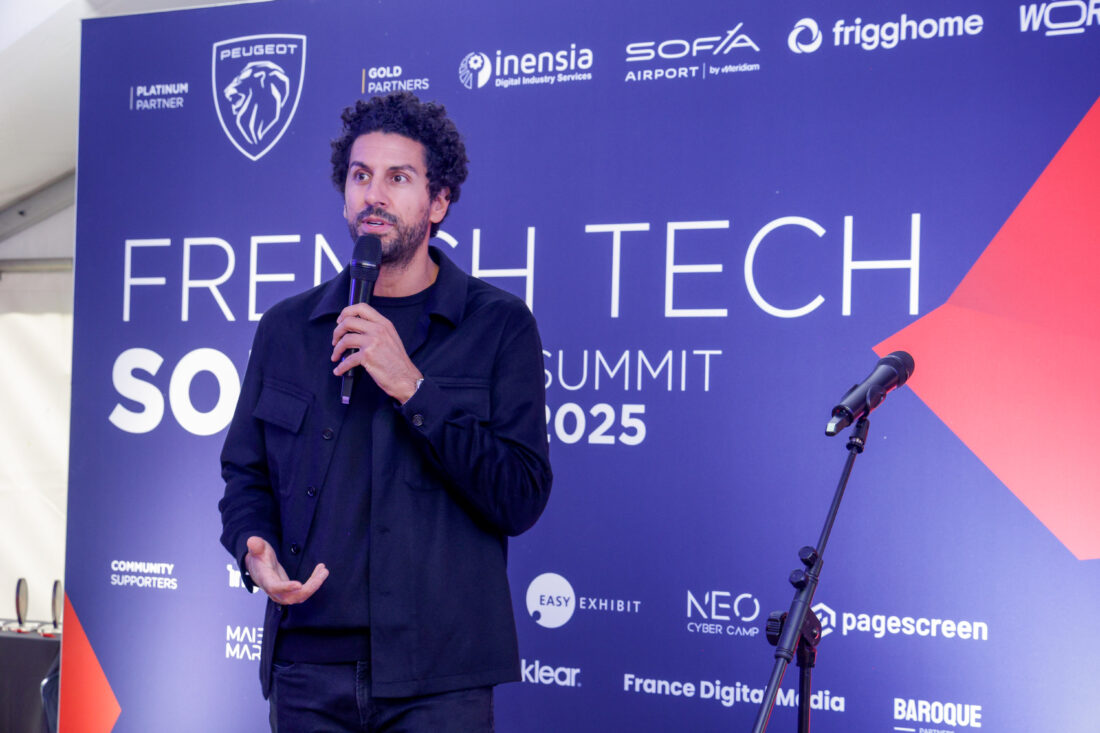 Jonathan Anguelov sharing his experiences and business insights during a speaking session.