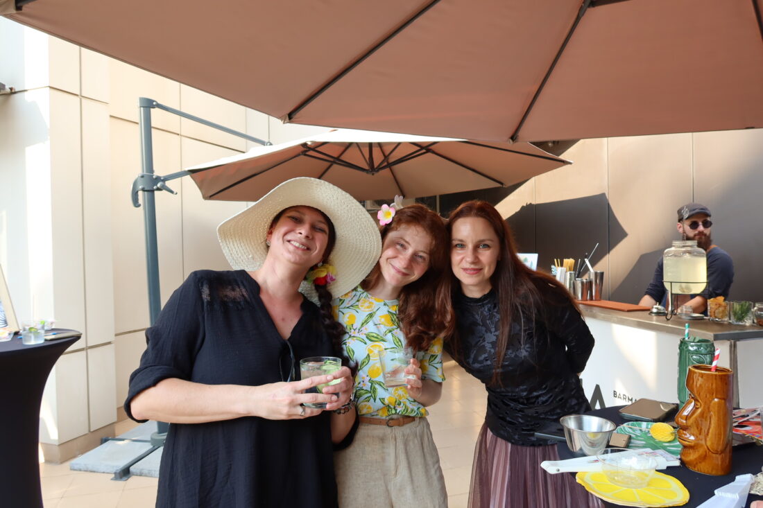 Laughter and connection as colleagues mingle during the summer kickoff