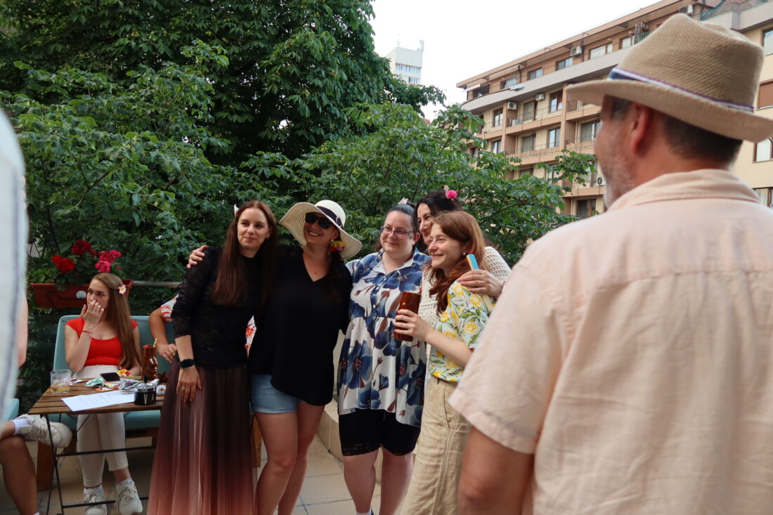 Laughter and connection as colleagues mingle during the summer kickoff
