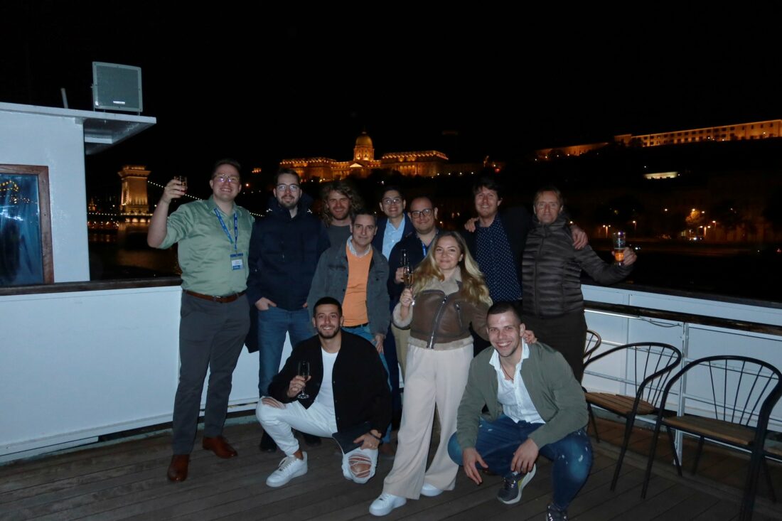 Inensia colleagues taking photos and enjoying the view from the Danube cruise deck