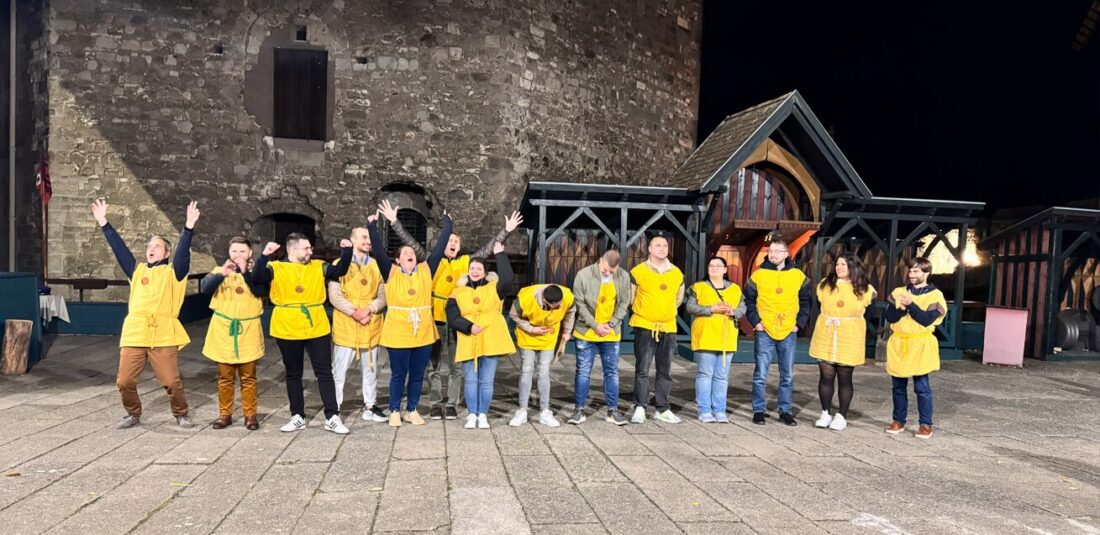 The winning team celebrating their accomplishment